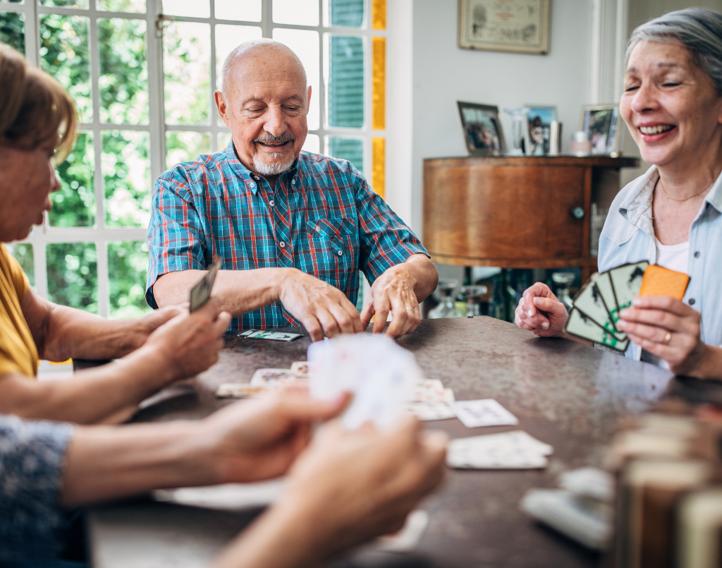 Smiling seniors building meaningful friendships and enjoying an active retirement lifestyle at Comfort of Living Retirement Homes.